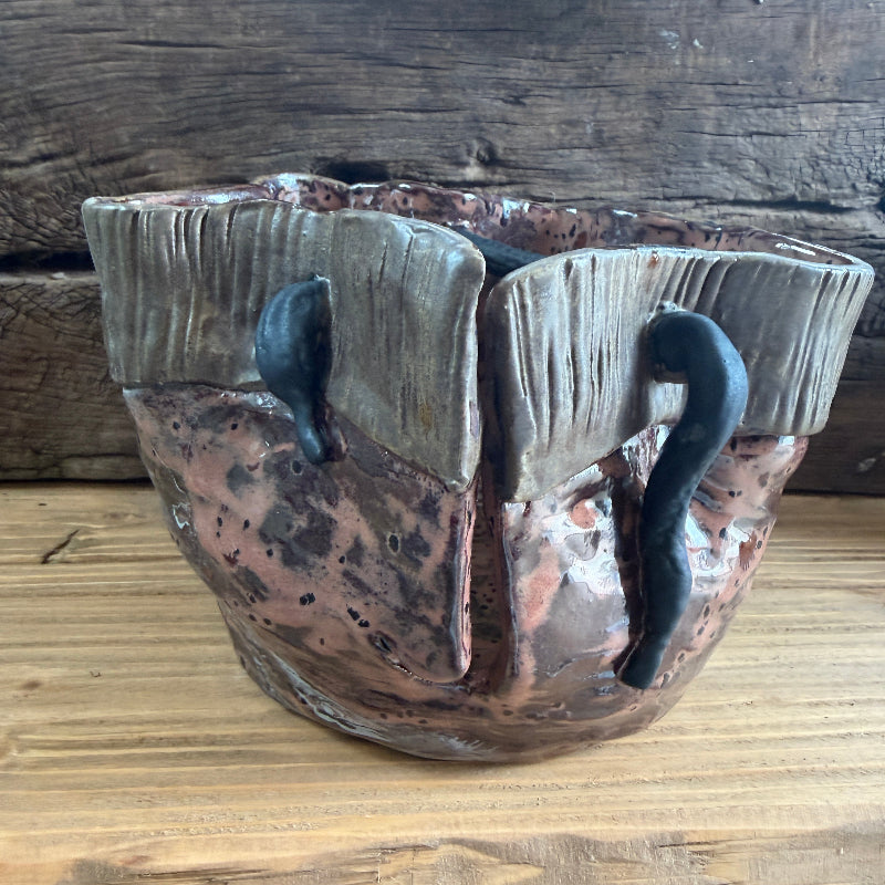 smuk og dekorativ strikkepose.